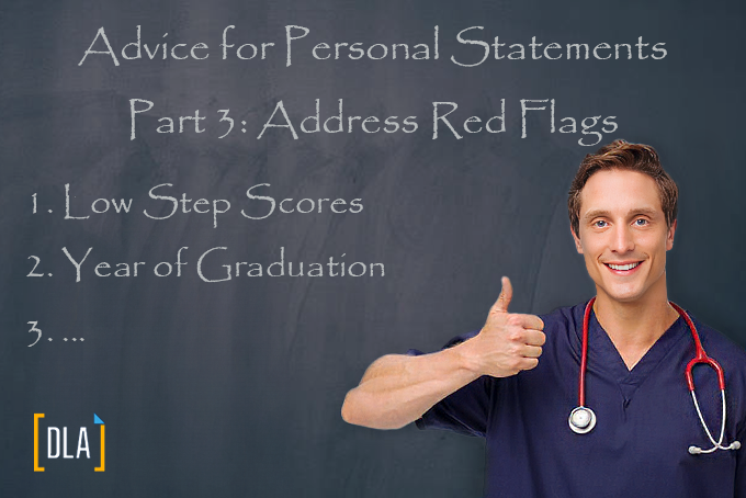 male doctor with thumbs up in front of blackboard